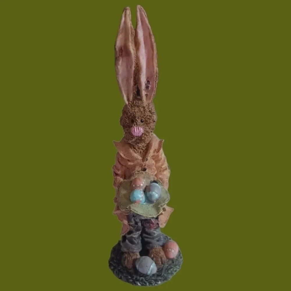 Easter bunny in a basket with easter eggs
